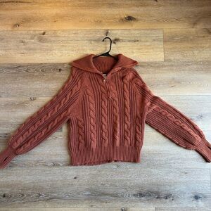 Grey Bandit Orange Sweater